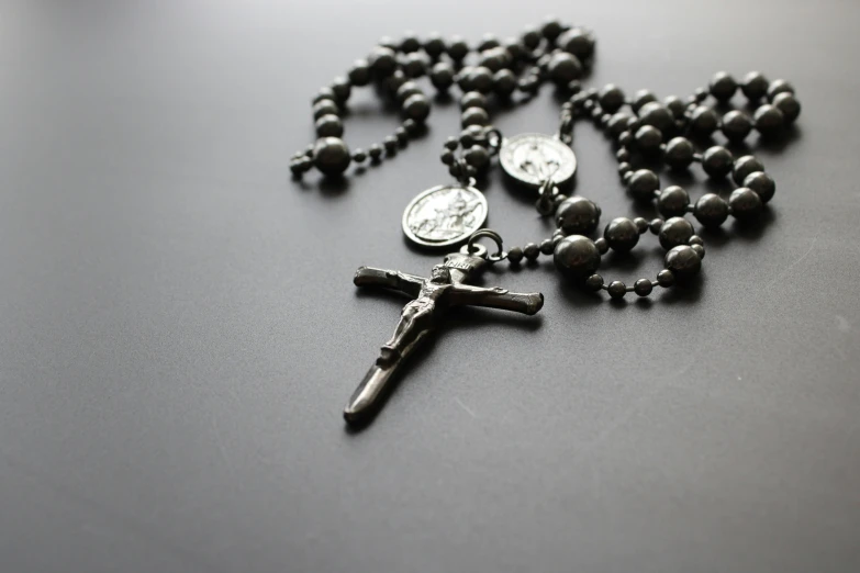 black rosary with st john and the cross pendants