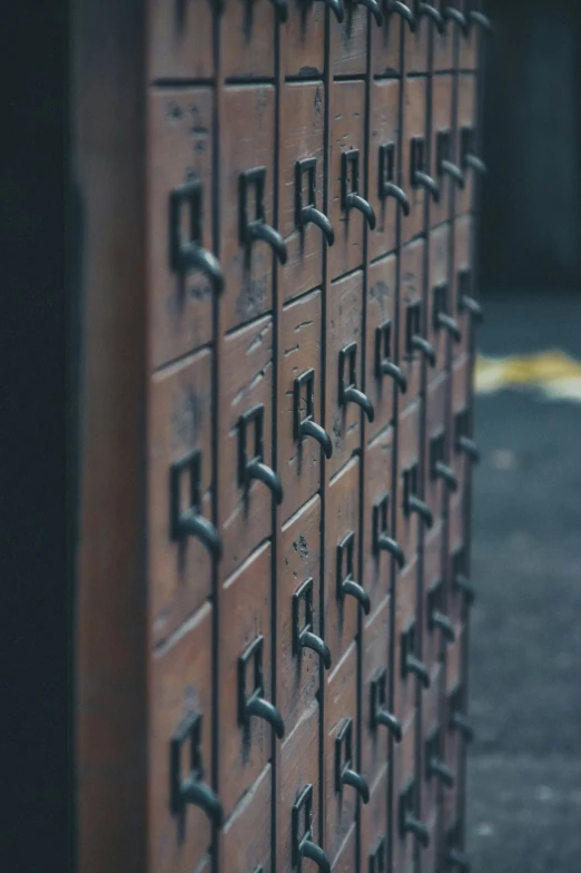 a very large metal chest of drawers with letters and numbers on it