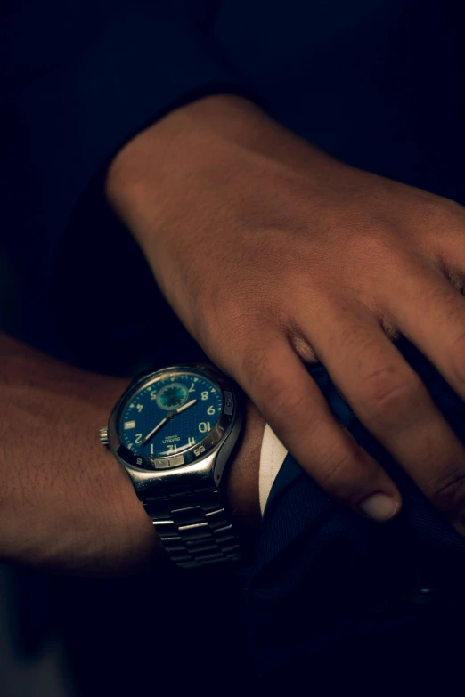 a person with a watch on their wrist