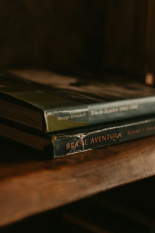 two bookcases with a wooden surface and two of them green