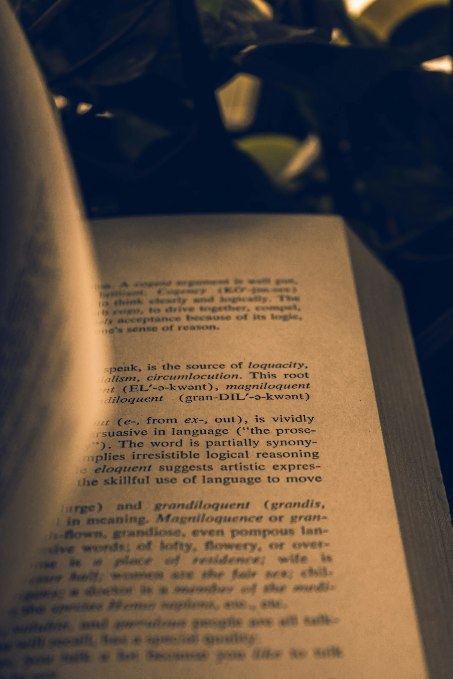 a book is open on a table with a bookmark