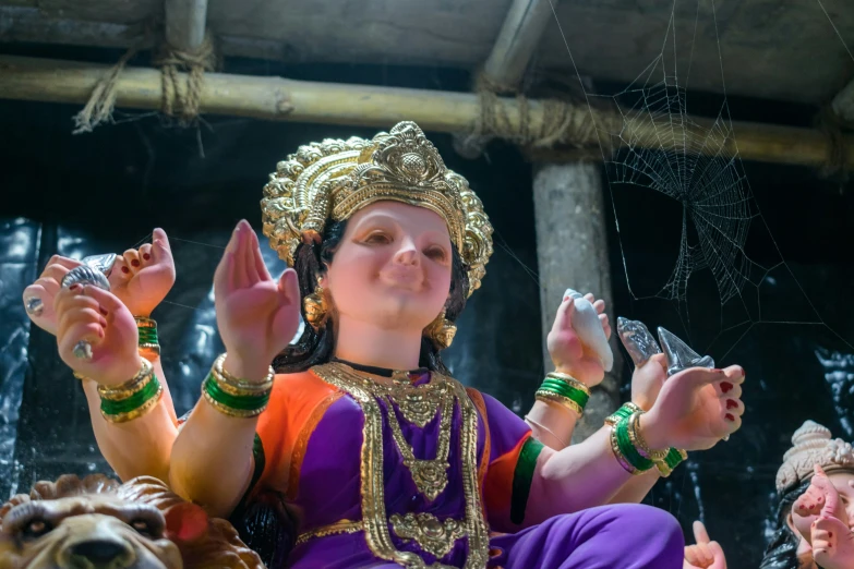 a person that is dressed in a garuda dance costume