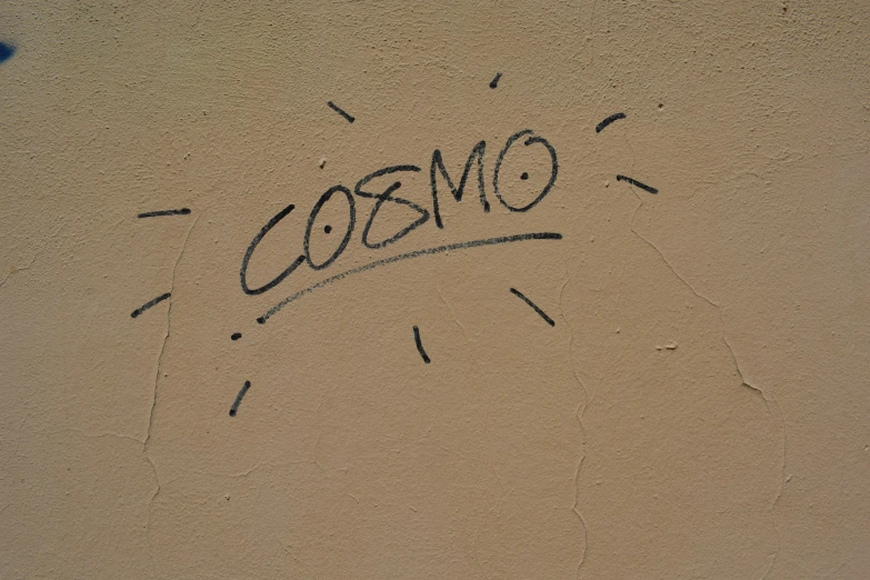 graffiti writing on a wall reading o bomb