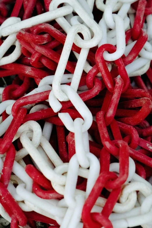 many different red white chains stacked together