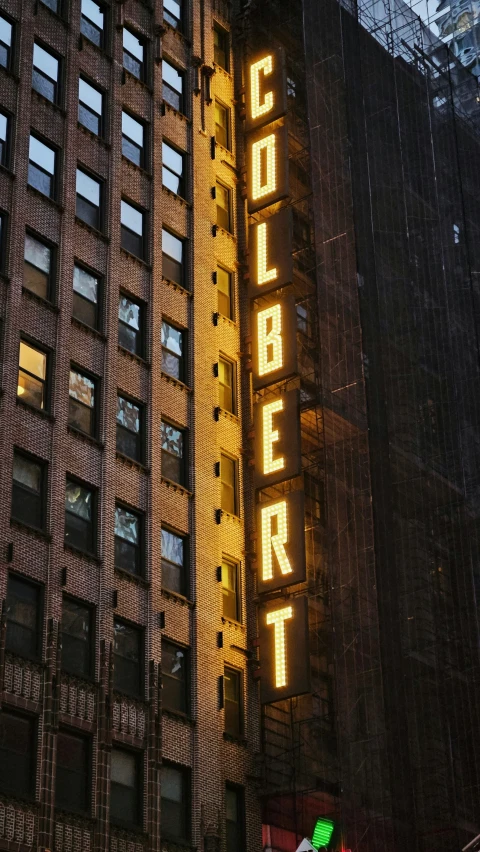 the sign on the building reads planet theater