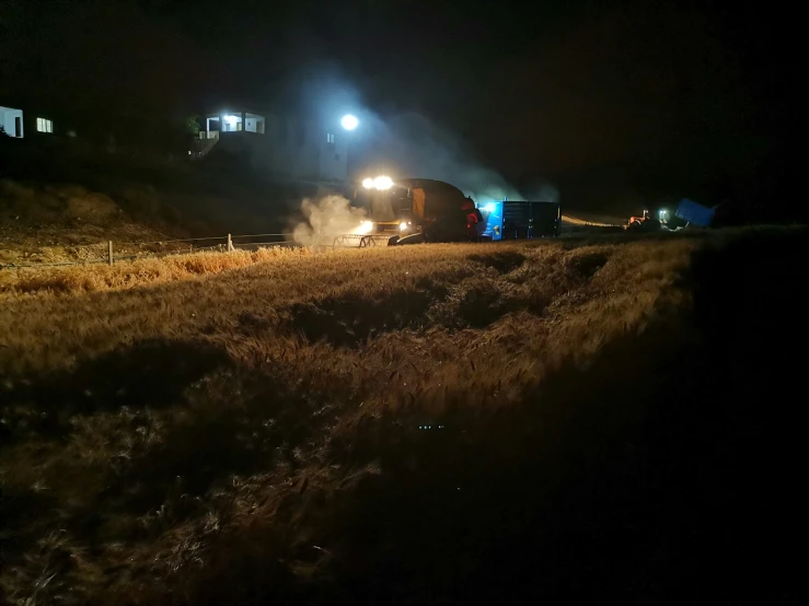 a po of an outback car being unloaded at night