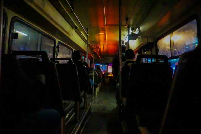 the inside of a bus that contains no people