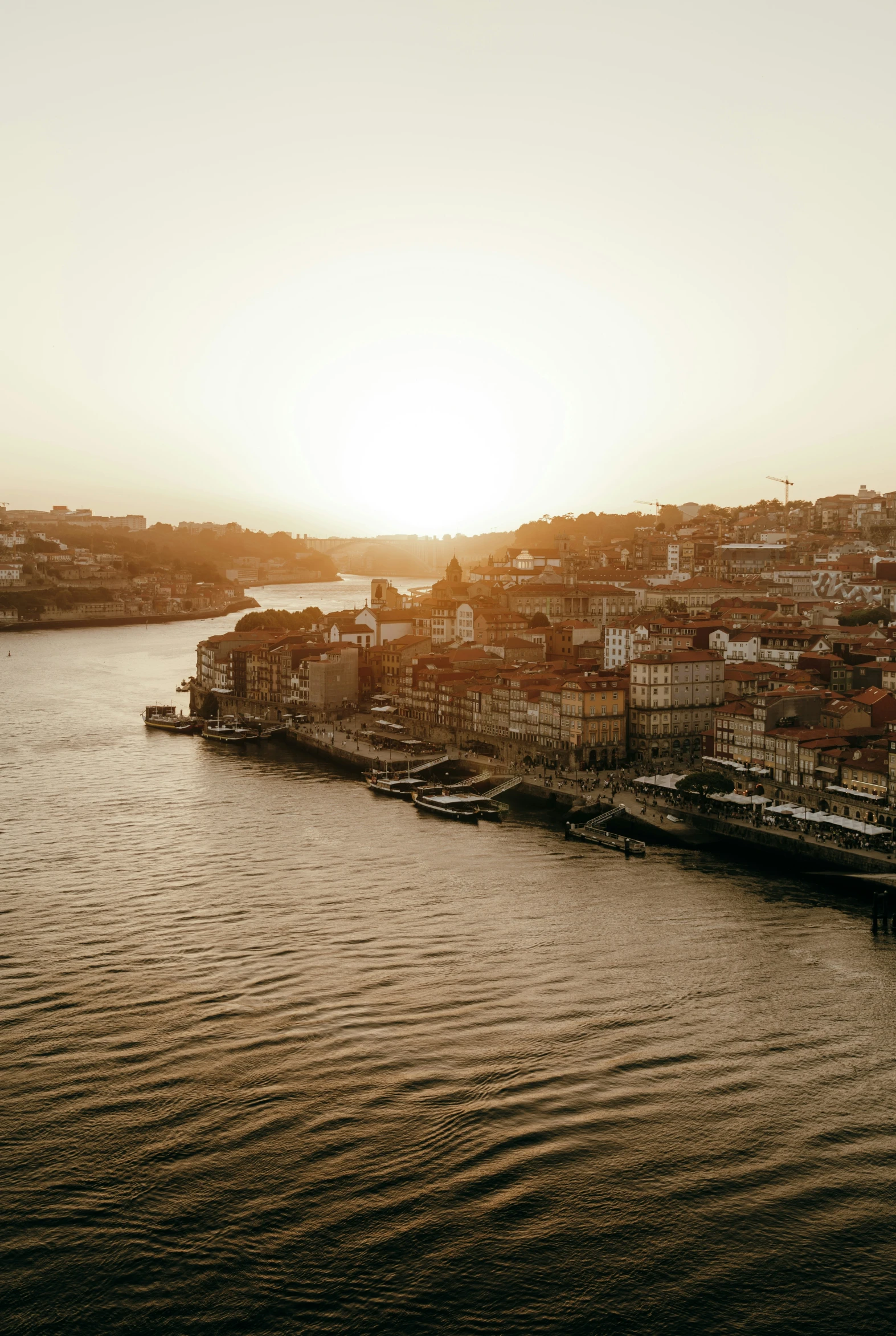 a waterway at the edge of a city with boats