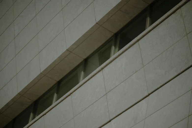 an outside view of an office building with windows