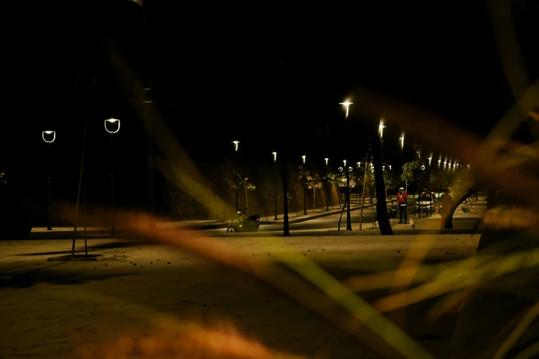 a street view at night and street lights