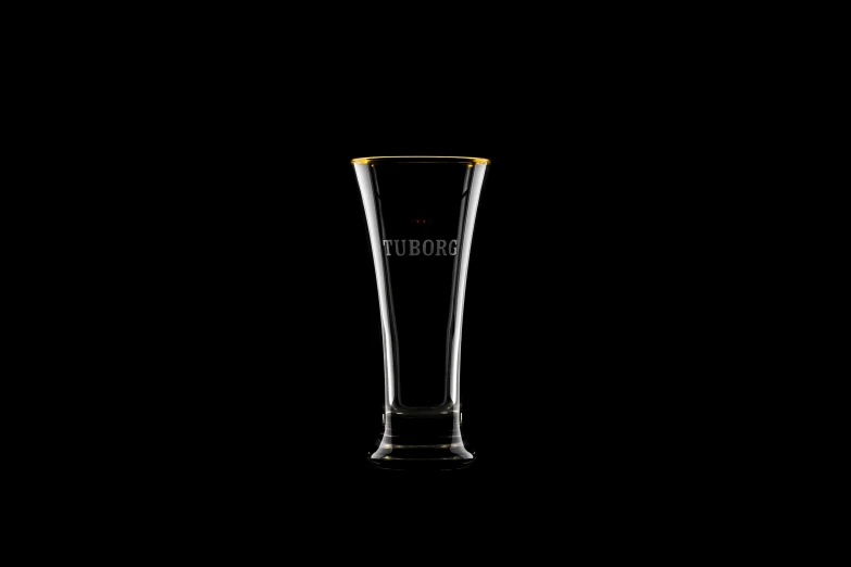 a black background with a glass on top