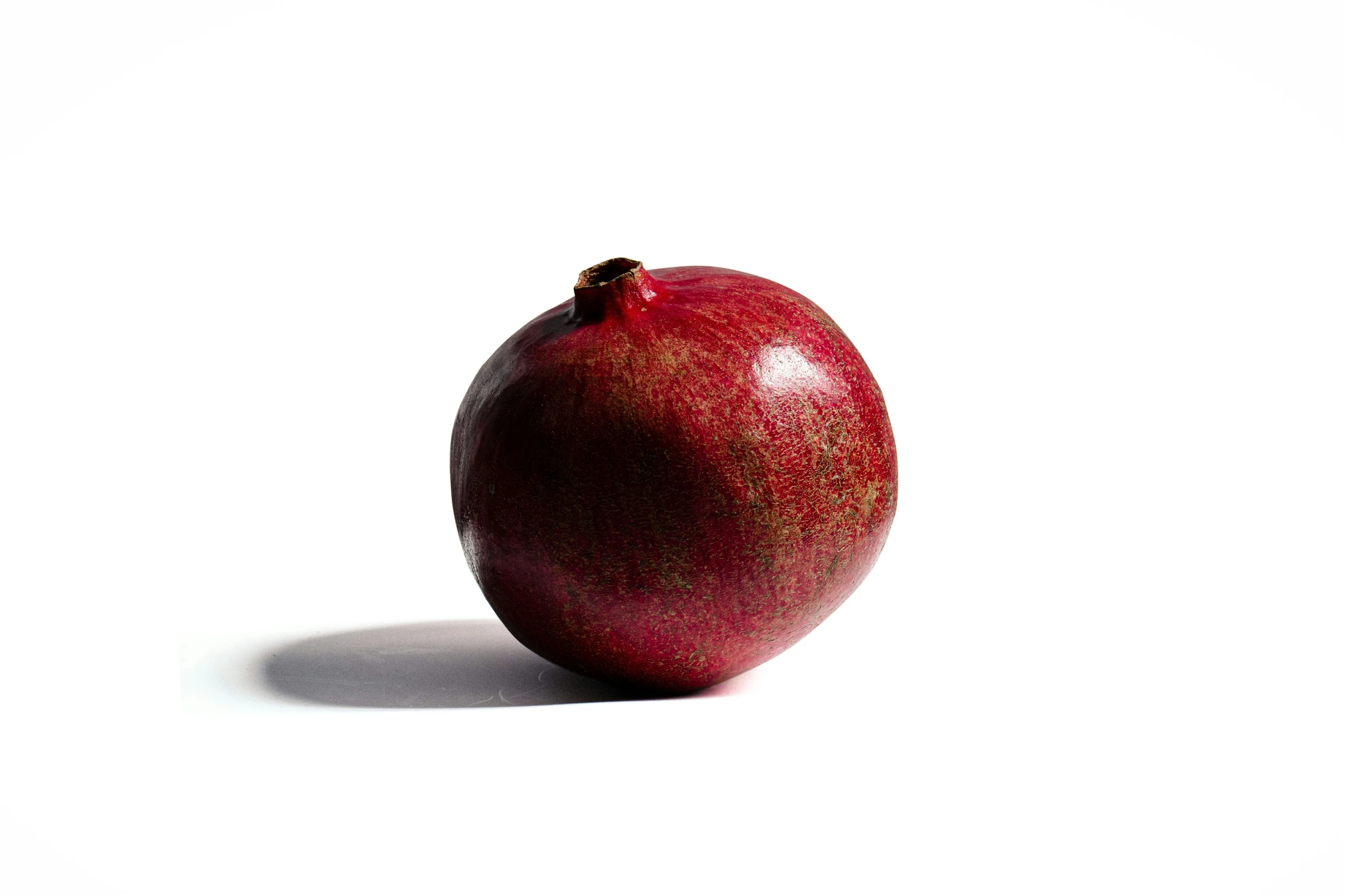 the apple is half red and half green