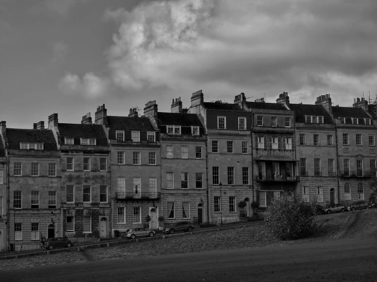 a row of abandoned houses in the countryside