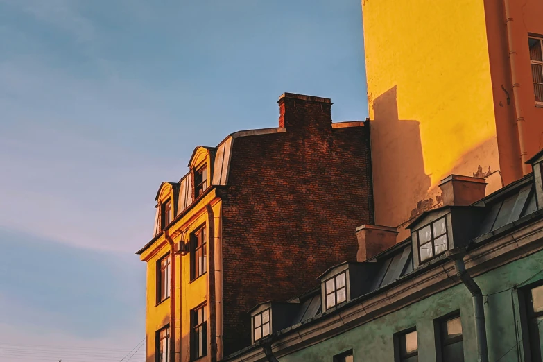 a very tall building next to another building