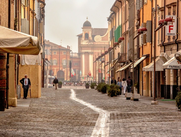 a street is full of shops in the city