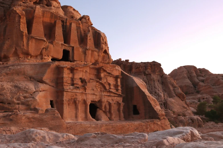 a huge rock formation with an arch in the middle