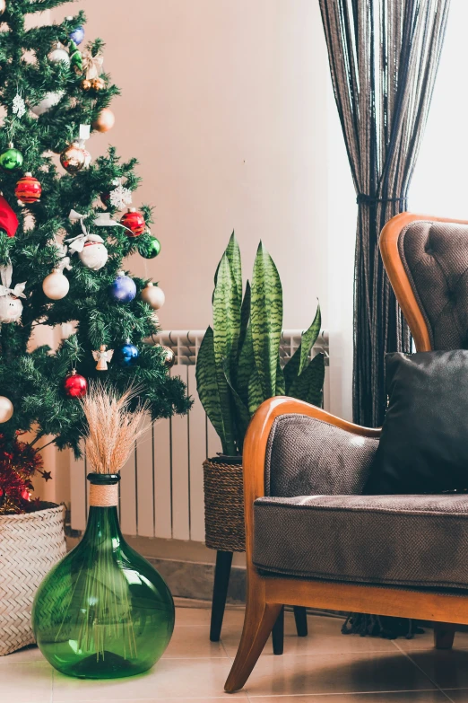 the room has two wooden chairs with christmas trees in them