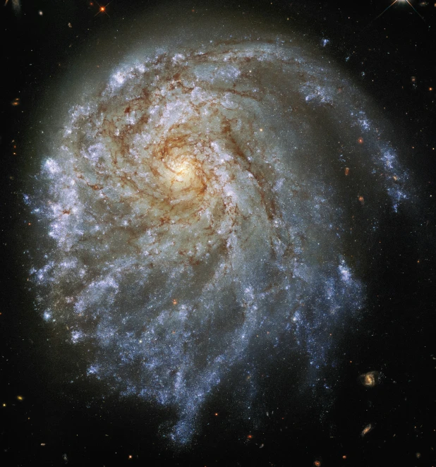 a very large galaxy that looks like a swirling star