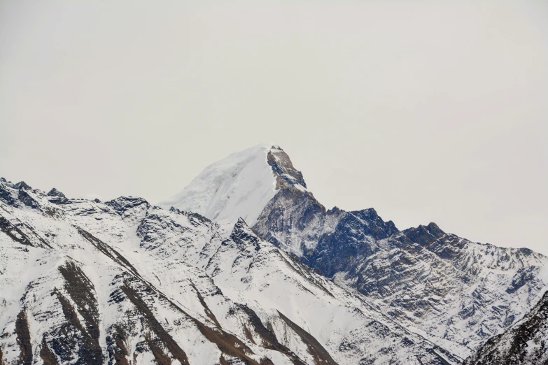 a mountain landscape is seen in a clear day