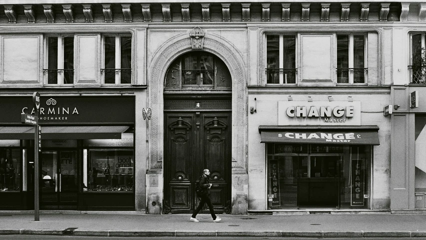 black and white po of the exterior of an old business