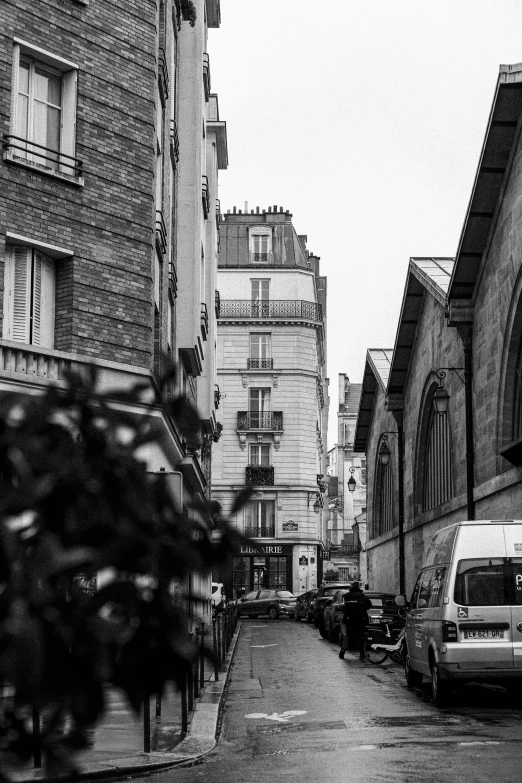 black and white po of street with parked cars