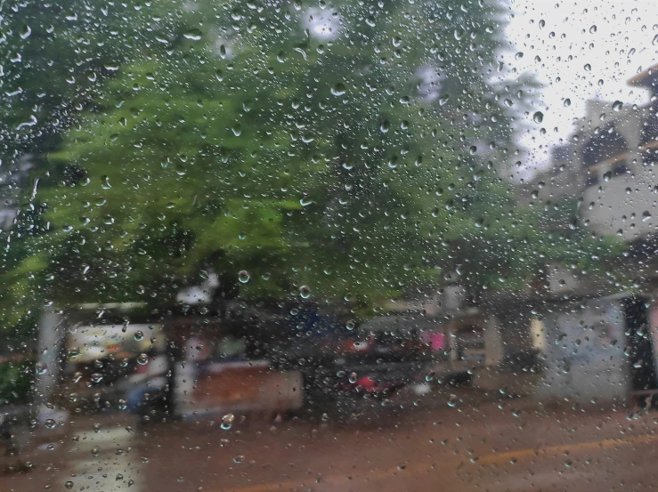 the view from a rainy window in an apartment