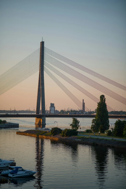 a group of jet airliners flying over a bridge