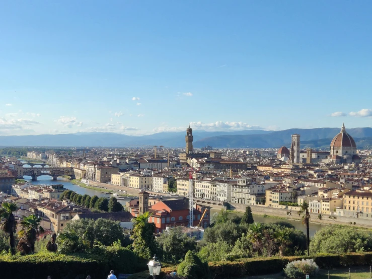 a view of a city from above on a sunny day