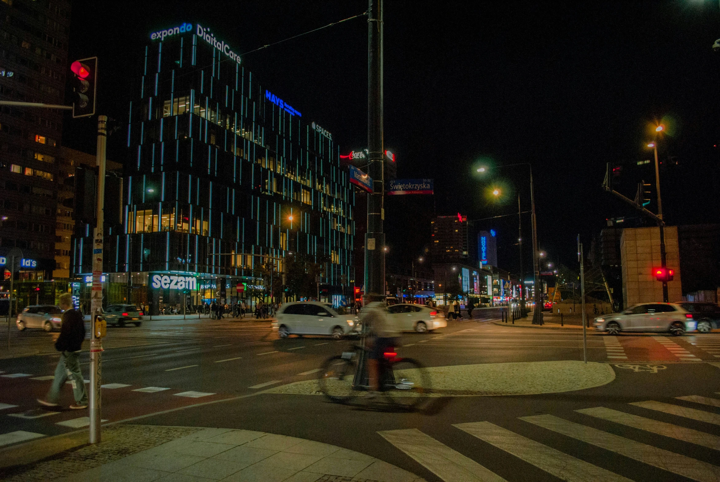 night time view of traffic and tall buildings in a city