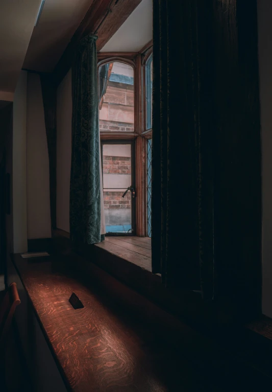 an empty table is pictured with the open window