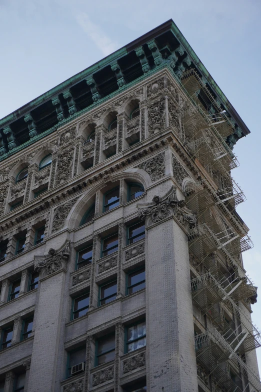 a very old building with scaffolding on the side