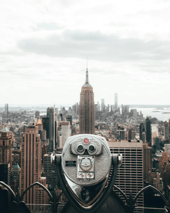 a coin operated view looking over the city