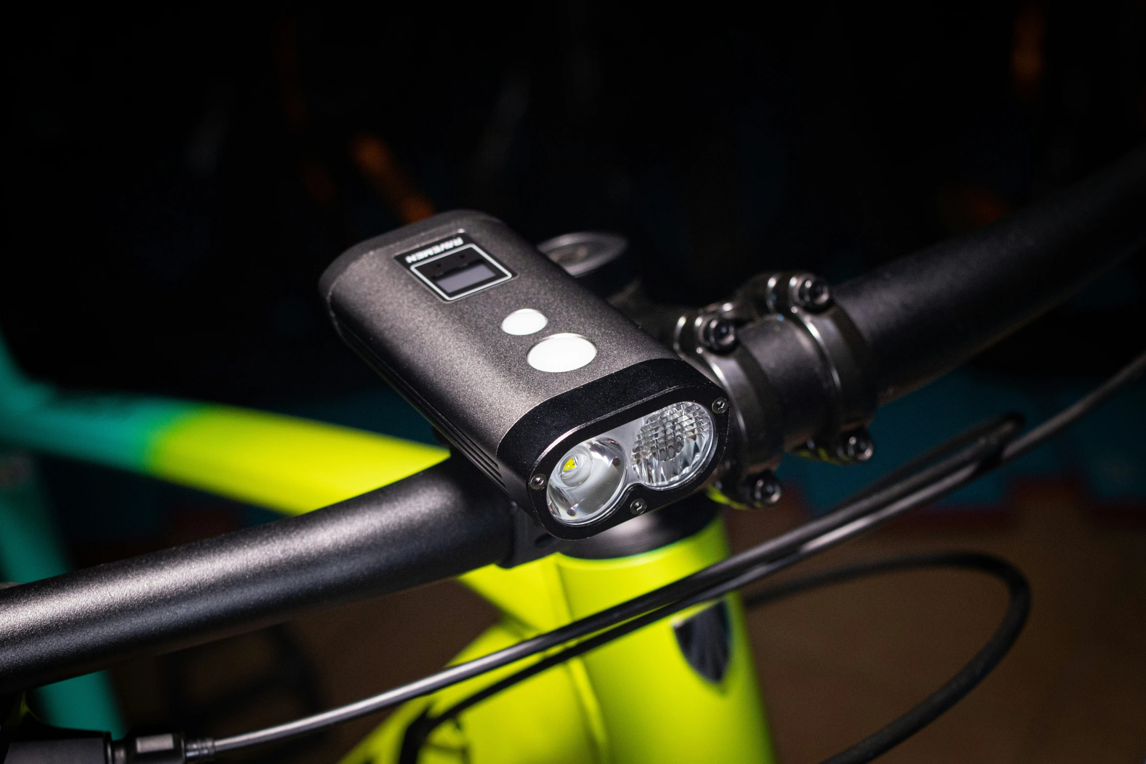 a light that is on on the handle bars of a bike