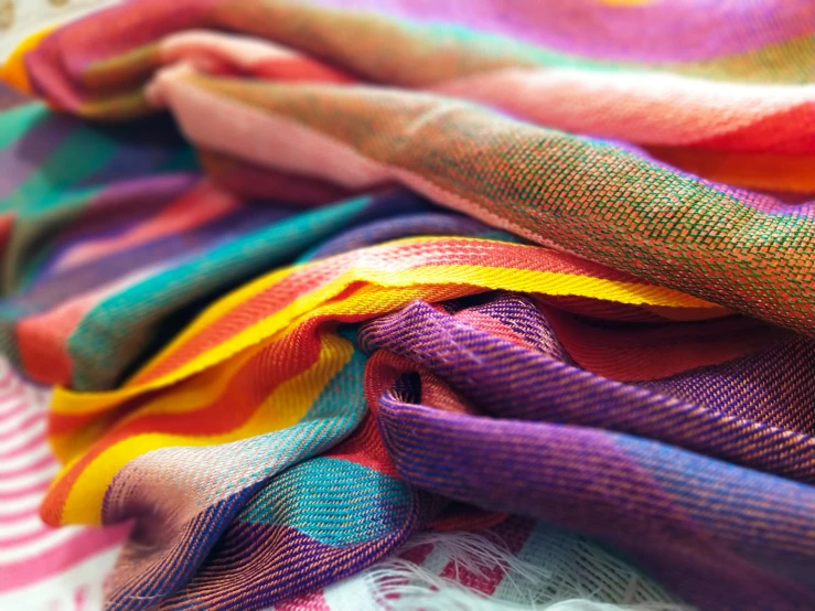 colorful fabrics with stripes on a table