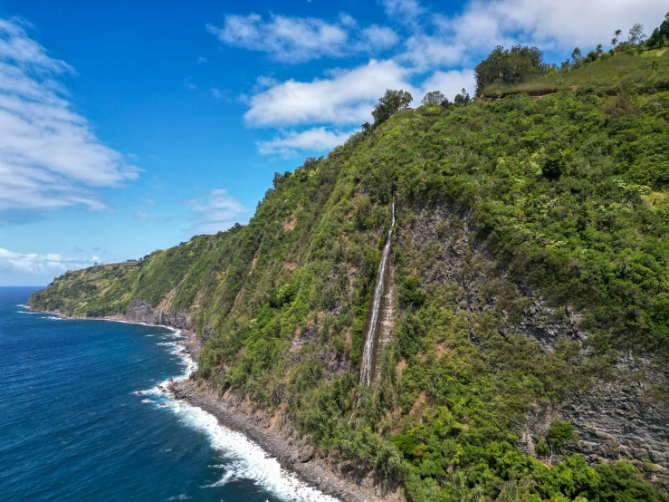 a long narrow winding steep hill near the ocean
