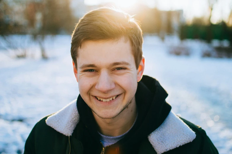 a man who is smiling for the camera