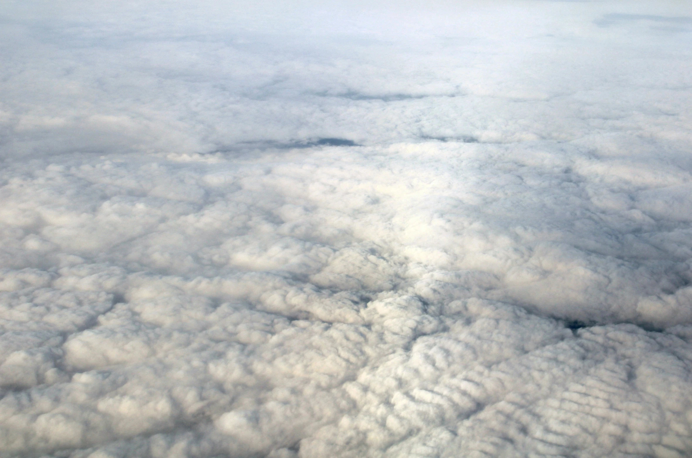 clouds in the sky are seen from a plane