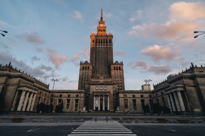 a large cathedral with a sky background