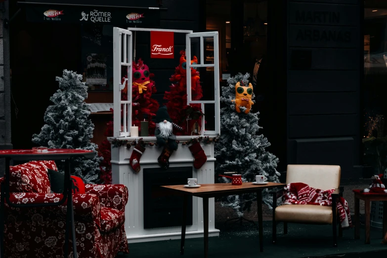 christmas decorations displayed at the window of a store