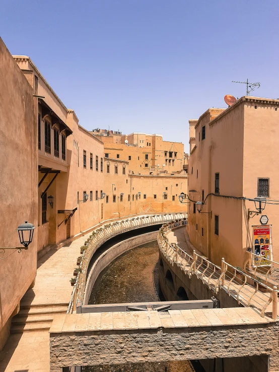 an old tunnel in a narrow village on a sunny day