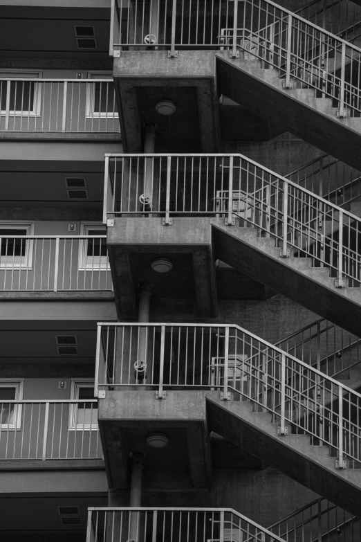 a very tall building with a few balconies