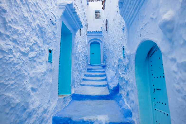 several steps leading to a blue building in europe