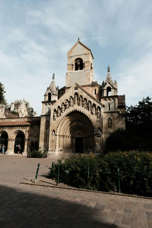 this is an old church, in the middle of some brick courtyard