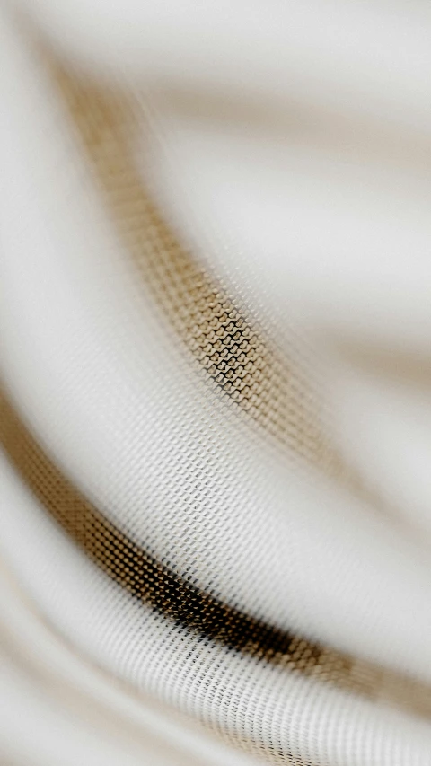 an image of an abstract beige and black background