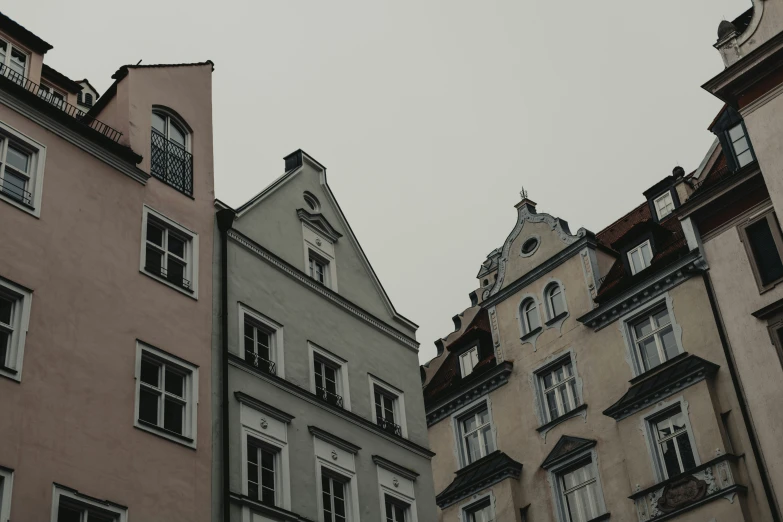 a po taken looking up at some buildings