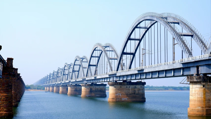 a long bridge that spans over a river