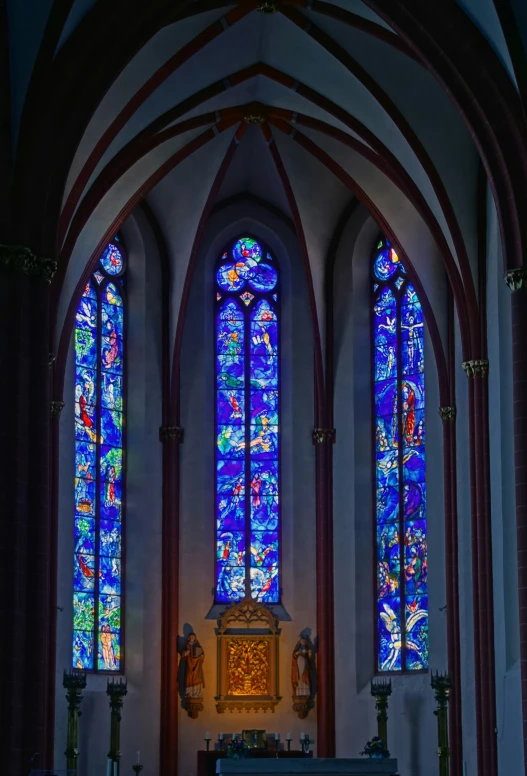 a church with many stained glass windows inside