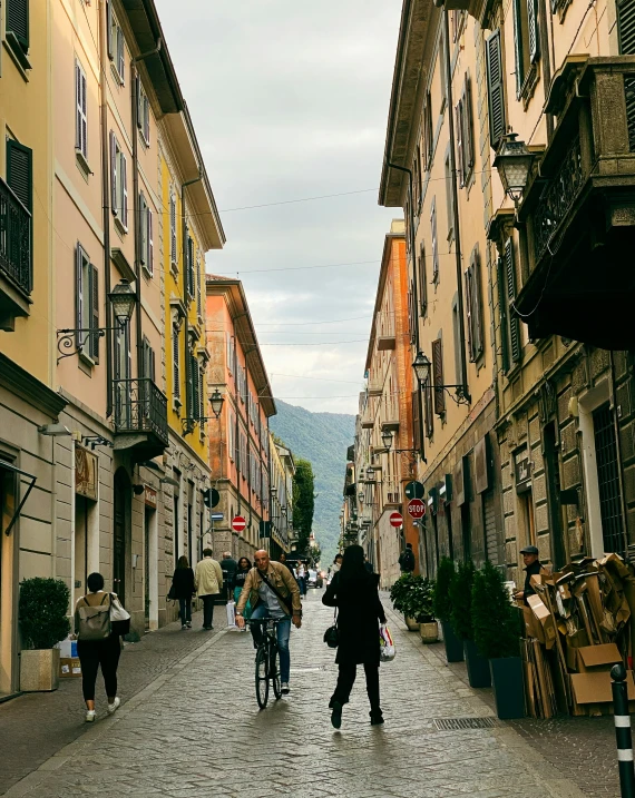 a group of people that are walking down a road