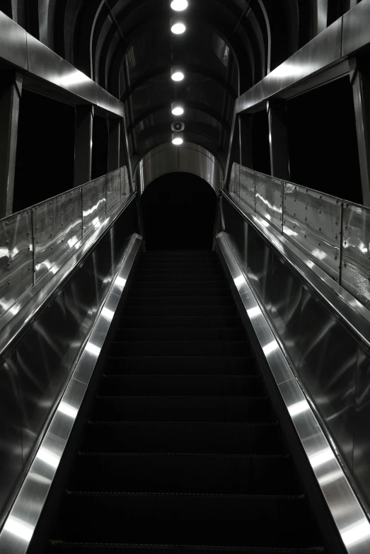 a set of escalators leading to the exit