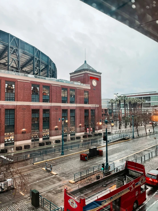 an empty train station and bus station in the rain